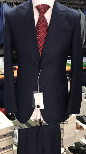 Navy super 150 Cerruti 2 button wool suit with peak lapel double vent/open button sleeves/flat front pant/patch pocket.