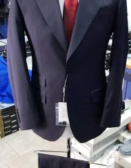Navy super 150 Cerruti 2 button wool suit with wide peak lapel/double vent/open button sleeves/flat front pant/ticket pocket.
