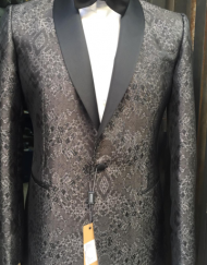 Grey textured silk and wool shawl lapel dinner jacket with tuxedo black pant. Available in size:38-60 reg/long. Double vent, open button sleeves.
