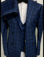 Navy 3 piece windowpane super 150 Cerruti wool suit with double breasted vest, double vents on suit,wide peak lapel double hand stitched, slanted ticket pocket, soft Neapolitan structured shoulders, flat front pant. Available in sizes 36-54 regular and long including custom bespoke.