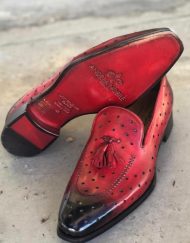 Ox blood perforated leather slip on with tassel.  Available in size 6-15. We can also custom design and make any of our shoes in any size