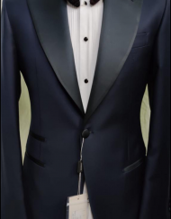 Navy blue and black silk 5 inch wide peak lapel luxury tuxedo. With double vents, ticket pocket. Available in sizes 36-52R/L and can be custom in any size.