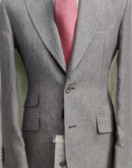 Grey sharkskin luxury Loro Piana linen summer suit with wide 5 inch peak lapel. Double stitched, double vents, ticket pocket with soft Neapolitan shoulders. Available in size 38-52 R/L