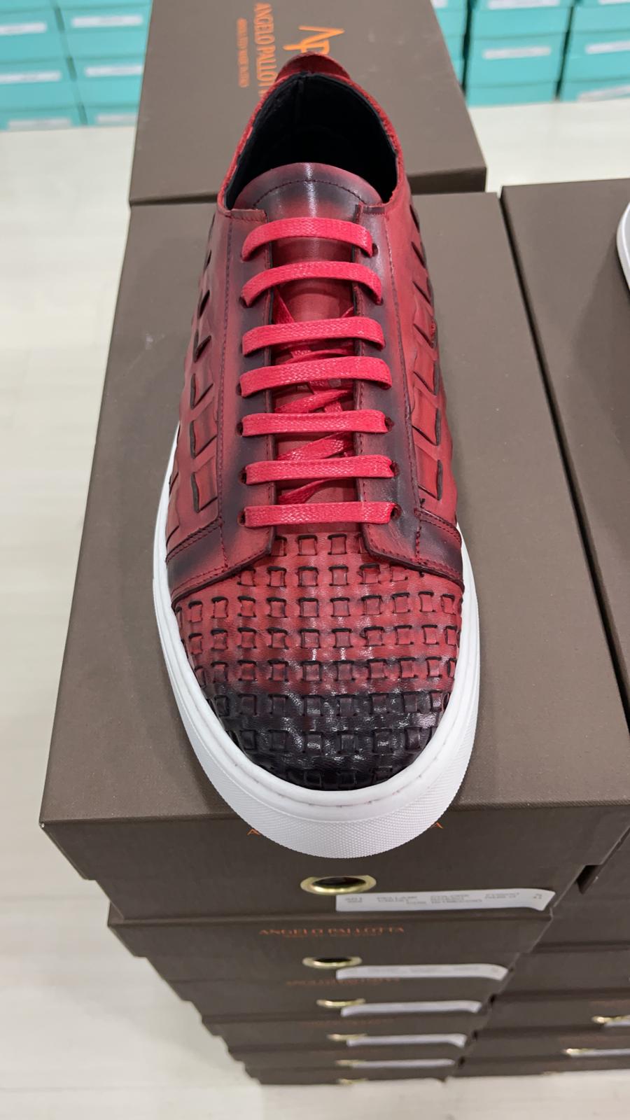 Red burnish all leather woven sneaker. Made in Italy. Five colors to pick from. Comfortable and fashionable. Available in sizes 7-13