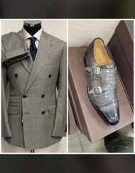 Grey sharkskin super 150 Cerruti double breasted wool suit with matching all grey skin print double monk strap. Soft Neapolitan shoulders on the suit, wide peak lapel, versatile and relax fit, flat front pant. Available in size 38-60 R/L. Both combination on sale. I will put this suit and any of our collection against any suit from Savile row in London.