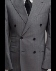 Grey shark skin pinstripe super 150 Cerruti double breasted wool suit. Wide peak lapel single stitched, ticket pocket, double back vents, flat front pant. Available in size: 40-60 R/L.
