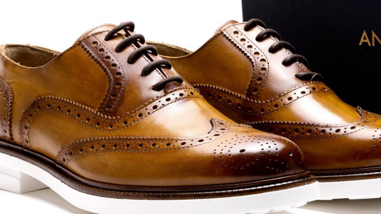 Cognac brown all leather upper wing tip oxford derby lace up with perforated toe. With patent white rubber sole for men. Fashionable and comfortable. Leather insole. Available in size 7-13 and custom for big and tall sizes. Hand made in Italy.