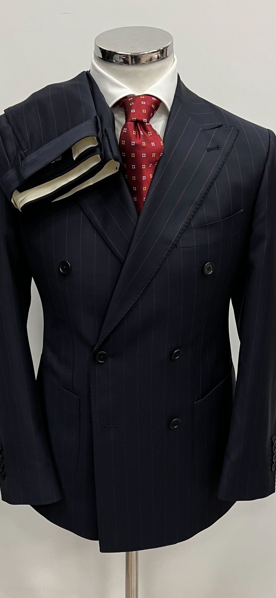 Navy blue with red pinstripe double breasted wool suit